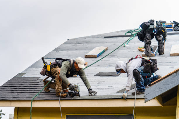 Professional Roof Replacement technician working in Belvue, KS